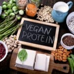 Vegan protein sources including beans, almonds, and soy milk
