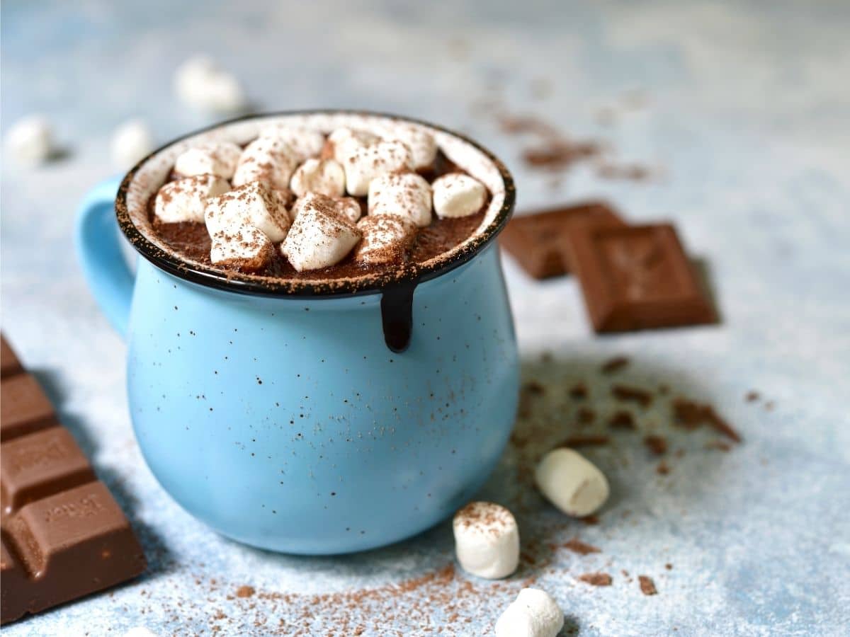 Hot Chocolate Topped with Marshmallows in a Blue Mug - Canva