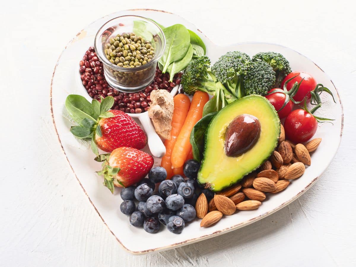Fruits Vegetables and Nuts in a Heart-Shaped Bowl