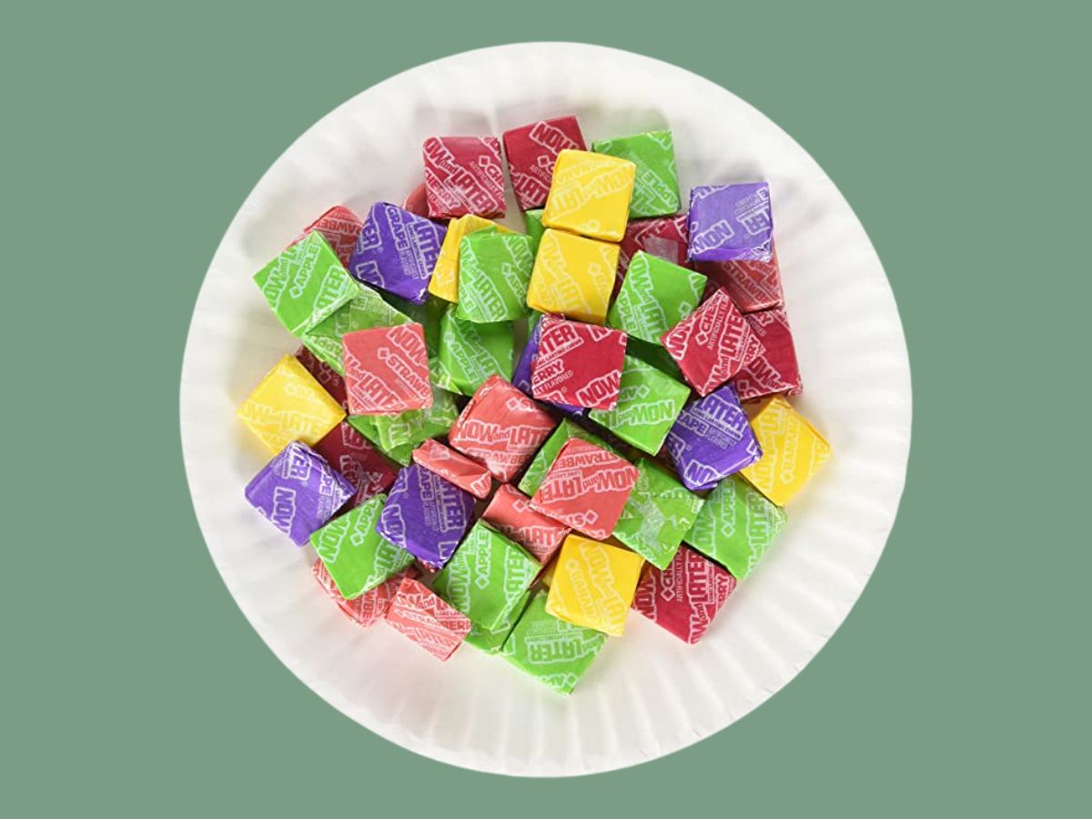 Now and Later candies on white paper plate