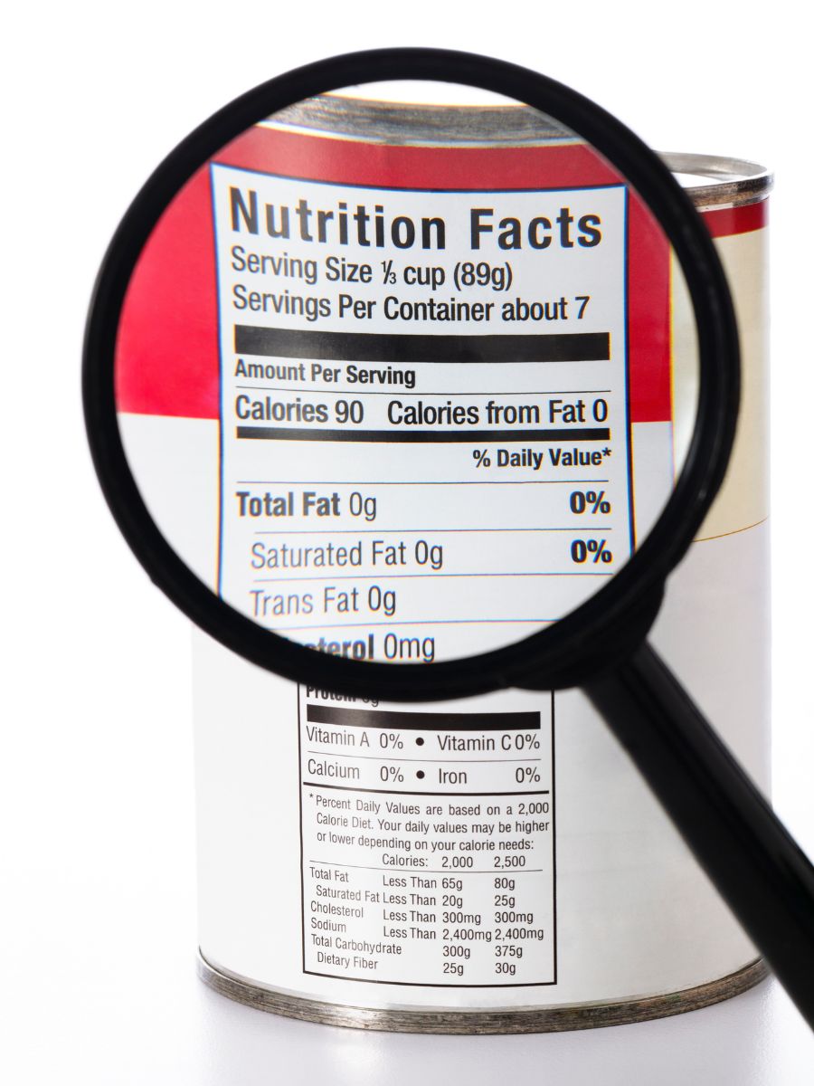 A magnifying glass showing details of a nutrition label