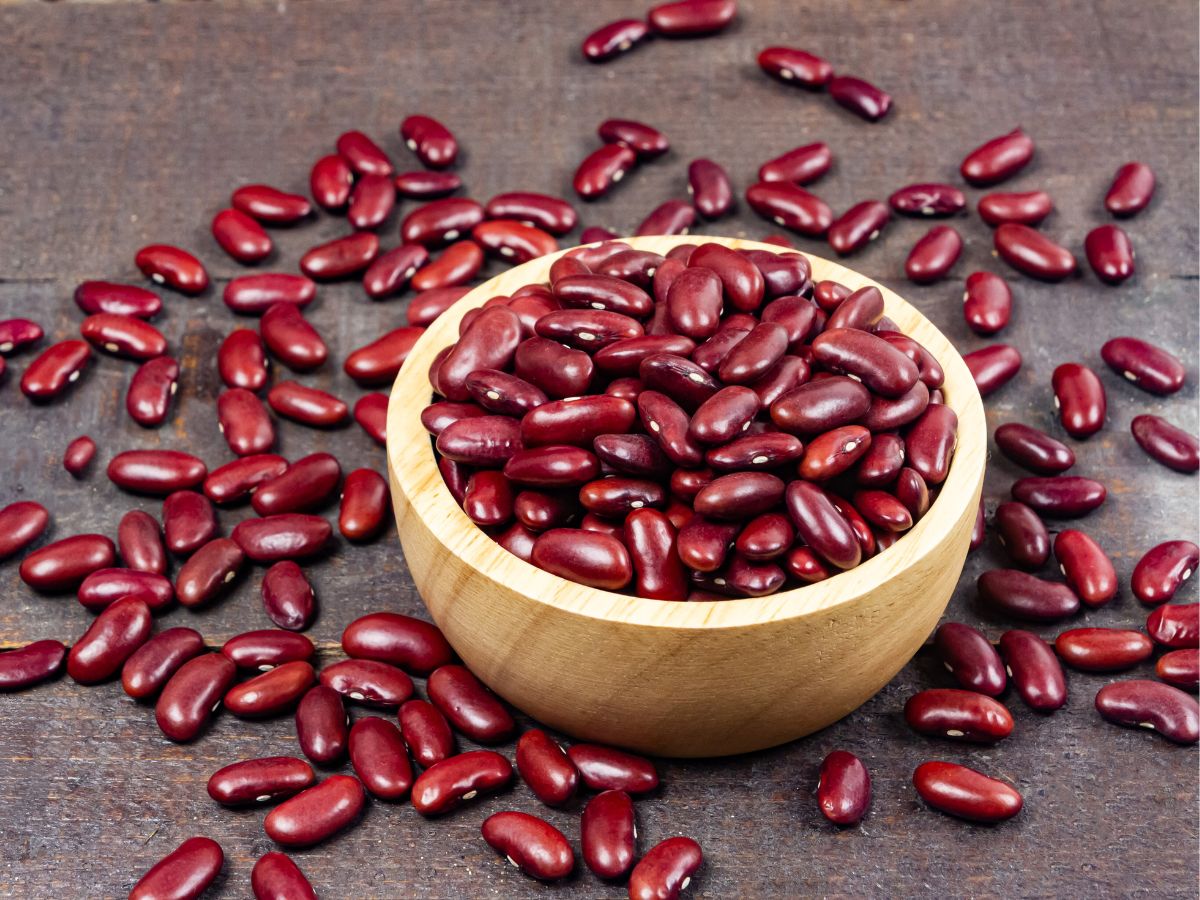 Light wooden bowl of red kidney beans