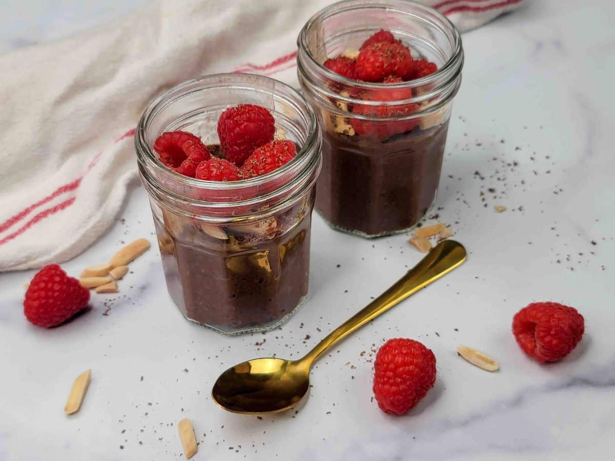 Chocolate Chia Seed Pudding Topped with Raspberries.