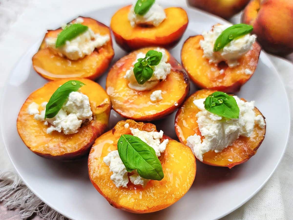 A plate of stuffed peaches ready to eat.