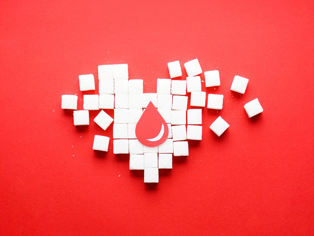 A heart made of cubes on a chia seed background.