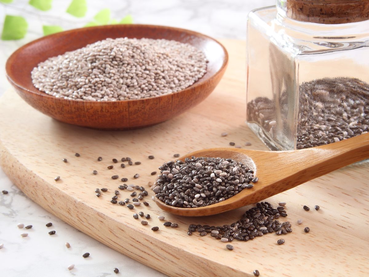 Wooden cutting board, chia seeds.