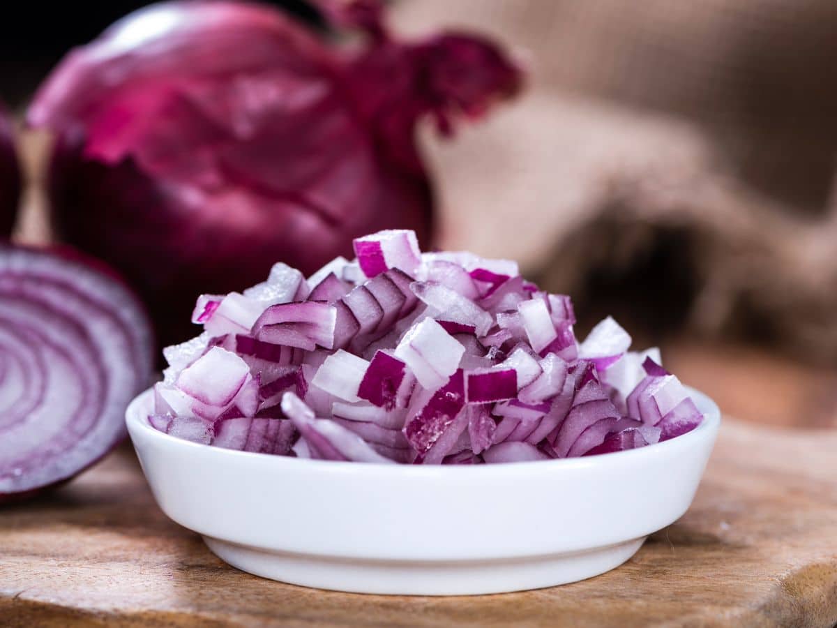 A bowl of diced red onions for Jennifer Aniston's quinoa salad.