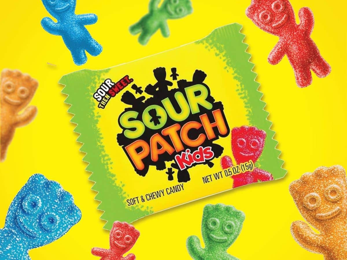 Sour Patch Kids candy on a yellow background.