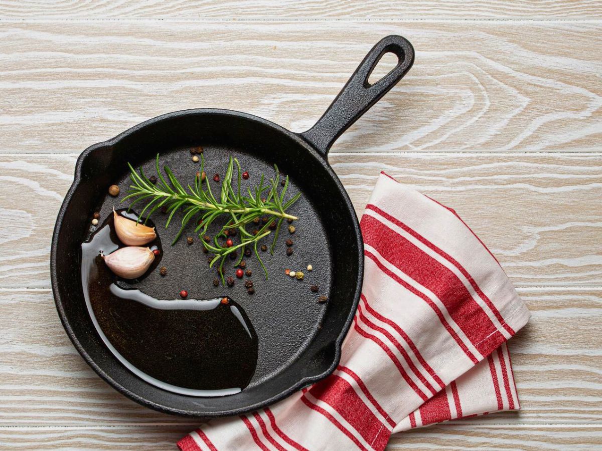 A perfectly seasoned cast iron skillet pan ready for use.
