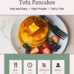 A plate of tofu protein pancakes topped with a pat of butter and a side of berries, labeled as a fast and easy, high-protein, dairy-free recipe from alphagal.