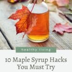 A bottle of maple syrup with a leaf on it, surrounded by autumn leaves, with text overlay "healthy living 10 maple syrup hacks you must try" by sagegal.