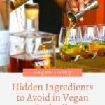 Person pouring amber liquid into cocktail glasses, with text about vegan ingredients to avoid in cocktails.